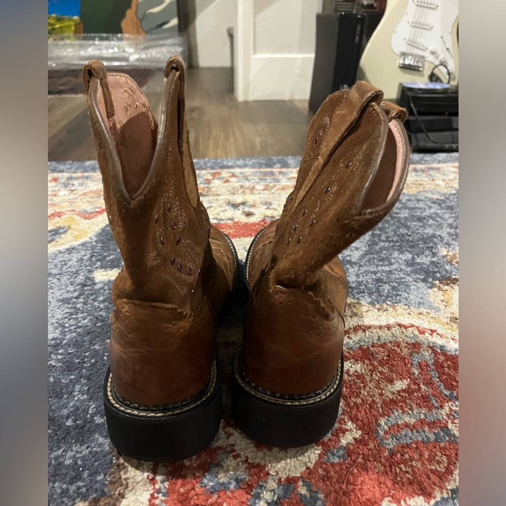 Ariat Fatbaby boots with pink bedazzle.